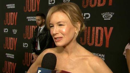 renee talking to a reporter on the premier of judy 